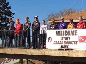 Nathaniel Mueller (middle white shirt) stands on the deck of the Lakeside Municipal Golf Course as a member of the Class 3A All-State Cross Country team. Photo by RVR's James Maretens.