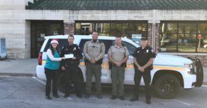 Law enforcement receiving a donation check from Jefferson Telecom. Photo courtesy of Cap. Heath Enns