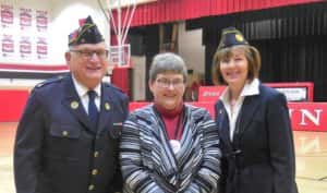 Kim Braun (middle) presented with a certificate of appreciation