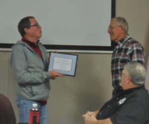Mayor Craig Berry (left) gives certificate to Councilperson Gary Von Ahsen (right) in recognition for his service on the Council
