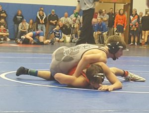 Panorama senior Danny Nordquist (gray singlet) works ontop during Saturday's sectional championship match against Colfax-Mingo's Cyden Fitch. Photo by RVR's Nate Gonner. 