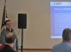 Matt Wetrich (left) talking about RAGBRAI to Rotary