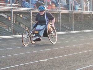 West Central Valley sophomore Suzanne Shoemaker wheels down the final stretch of the 400 dash competition April 10 in Earlham. Photo by RVR's Nate Gonner. 