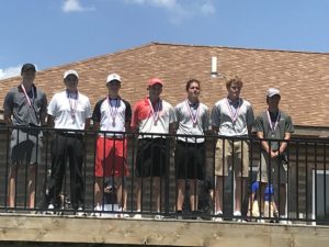 Moyer (third from left) poses for a picture with the Class 3A All State Golf team. Photo courtesy of the ADM Tigers Golf Twitter Feed.