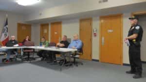 Police Chief Mark Clouse (right) explaining the camera situation to the City Council