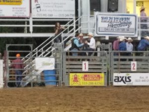 Sven Peterson (in blue shirt with black vest) prepares to ride "Mudslinger