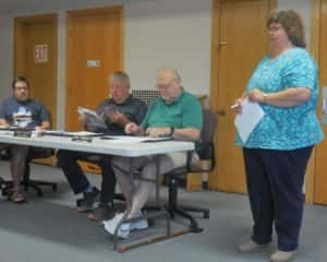 Library Director Jane Millard (right) talking to the Jefferson City Council