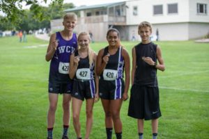 West Central Valley cross country runners (from left to right) Louden Foster, Aliyah Dickson, Emily Escoto, and Jayden Dickson pose for a picture with their medals from the Southeast Valley Invitational last Thursday in Gowrie. Photo courtesy of West Central Valley Cross Country's Facebook Page. 