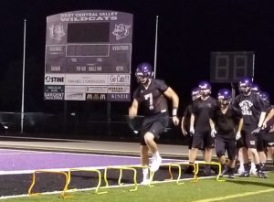 West Central Valley senior Carson Wadle performers conditioning drills during WCV's annual Midnight Practice on Monday, August 6. Photo by RVR's Nate Gonner.