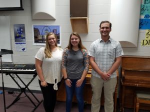 From left-right: Perry Drum Majors Allie Taggart and Adriana Eastman, and Band Director Brad Sparks