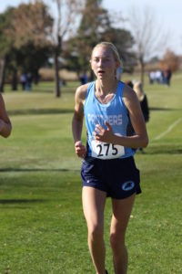 Panorama senior Brooklyn Behrends runs during the 2018 Iowa State Cross Country Meet last Saturday at Fort Dodge's Lakeside Municipal Golf Course. Photo courtesy of Panorama Cross Country/Jaime Waddle.