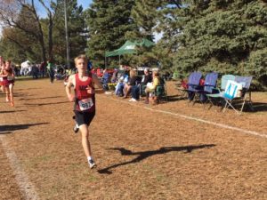 ADM sophomore Nate Mueller closes in on the finish line of the 2018 Iowa State Cross Country Race at Fort Dodge's Lakeside Municipal Golf Course. Photo by RVR's James Maertens.