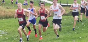 ADM sophomores Nate Mueller (#32) and Ethan Jurgens (#27) ran near the front of the pack during the first mile of the Leon Fox Cross Country Invitational in Perry. Photo by RVR's Nate Gonner. 