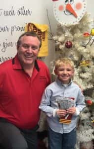 Doug Reider (left) with Keegan Minnihan (right) who won 4 ISU men's basketball tickets. Photo courtesy of PC Schools