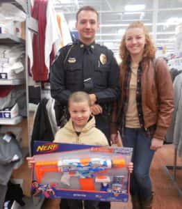 Heath and Addie Enns (L-R in back) and Lucas Carter (front) at Walmart