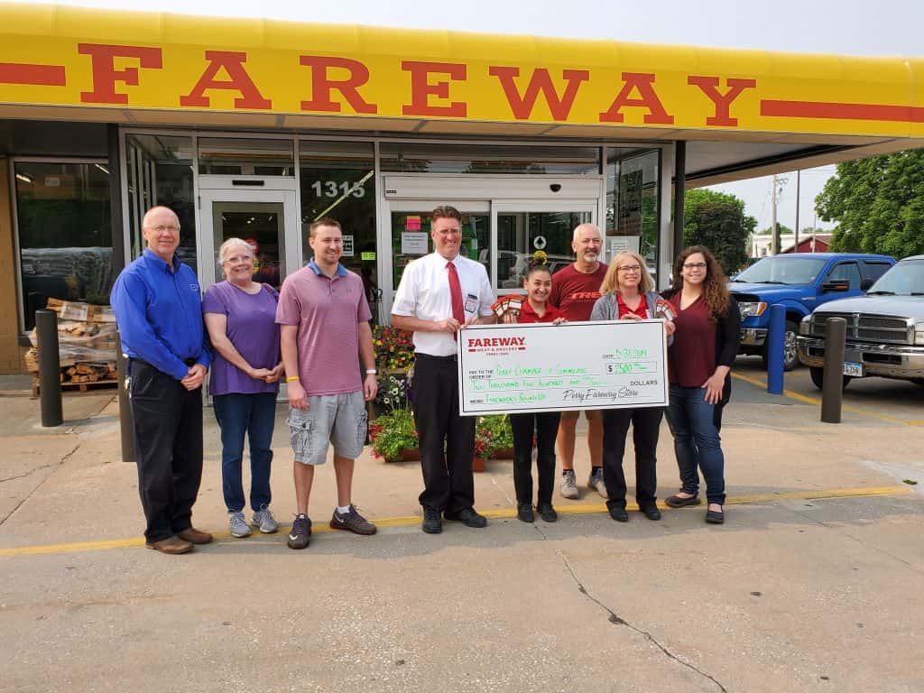 Perry Fareway Presents Fireworks Fundraiser Check to Chamber Raccoon
