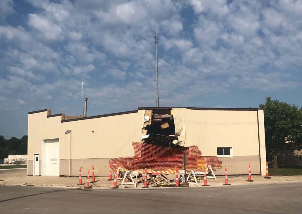 City of Guthrie Center Assessing Damaged Former Fire Hall after Truck
