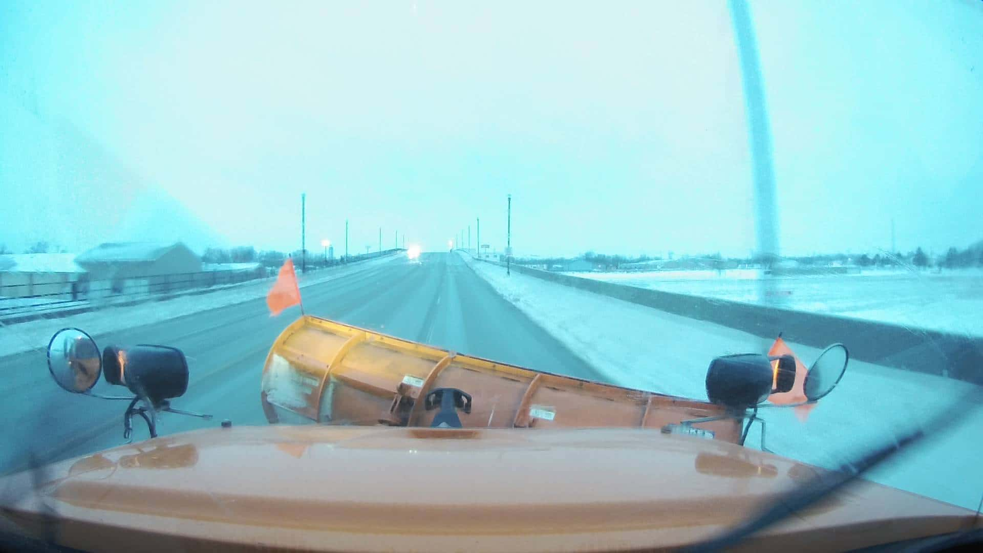 snow-plow-on-highway-30