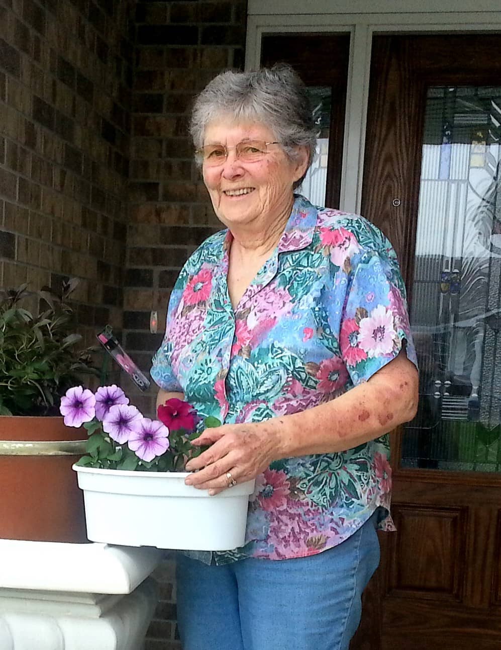 ruth-and-new-flowers-at-front-door-2