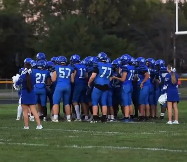 columbus-fb-team-huddle