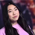 Awkwafina arrives for the â€˜Jumanji: The Next Levelâ€™ Los Angeles Premiere on December 09^ 2019 in Hollywood^ CA. LOS ANGELES - DEC 09