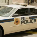 BI Police car is waiting at the J. Edgar Hoover FBI Building - United States of America
