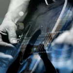 country artist/Guitarist with the audience in a double exposure