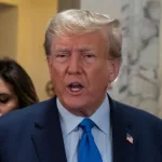 Former President Donald Trump speaks to press before the start of civil fraud trial brought by NYS Attorney General Letitia James at NYS court in New York on October 2^ 2023