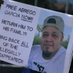 People marching on International Workers' Day in support of workers' rights and against the Trump agenda in Lower Manhattan.NEW YORK^ NEW YORK USA - May 1^ 2025
