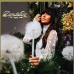 The image displays an Apple iPad running the Spotify app^ which shows the song "Be Her" by country artist Ella Langley from her album Dandelion.