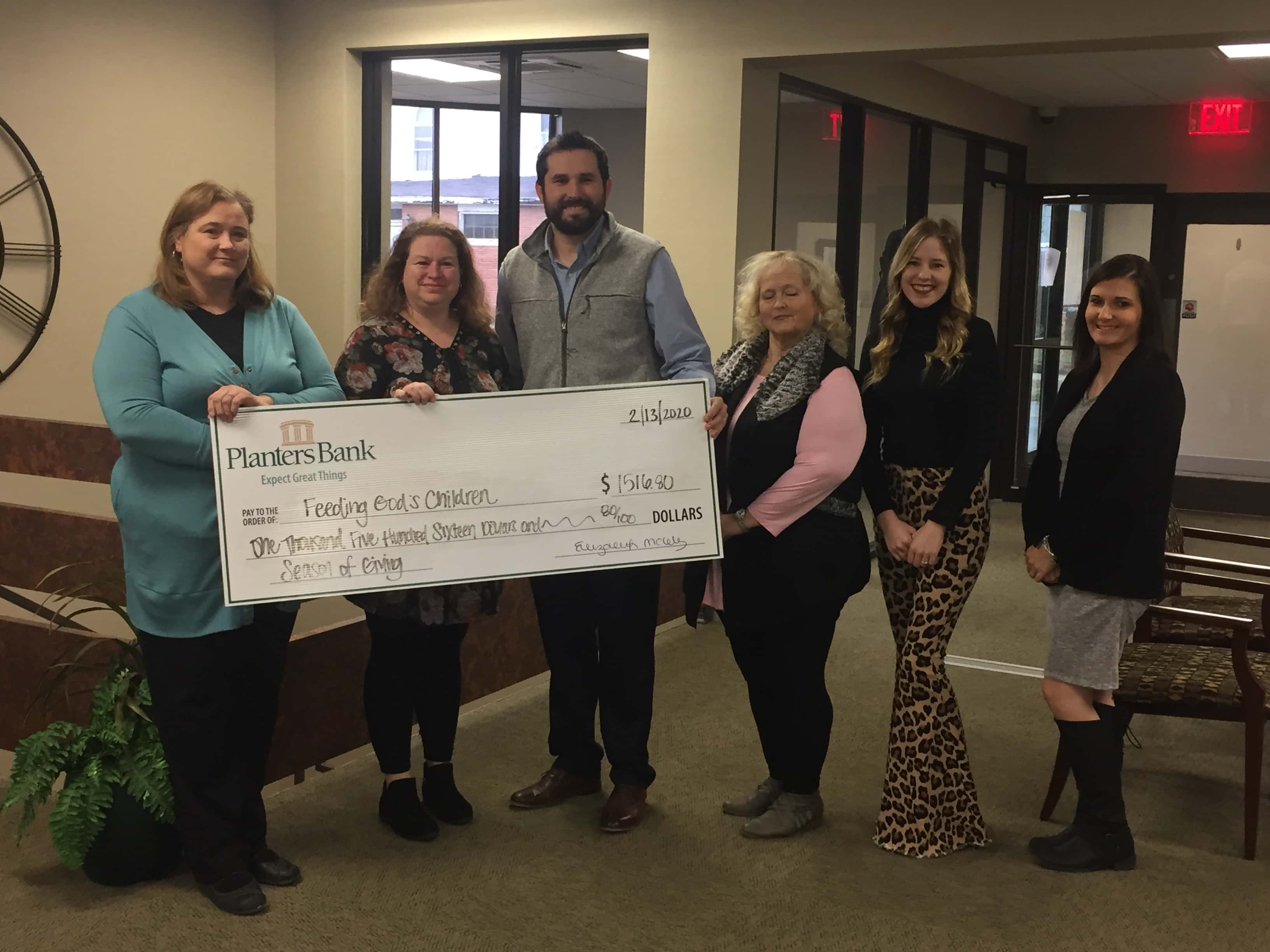 "Season of Giving" Donation Presented to Feeding God's Children WPKY