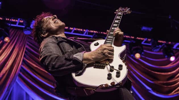 m_nealschon630_playingguitar_022619