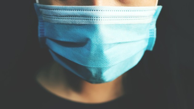 istock_12221_maskwearer