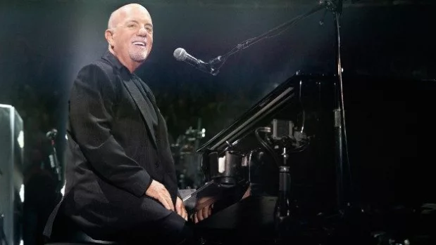 getty_billyjoelsmilingmsg_011025_0842380