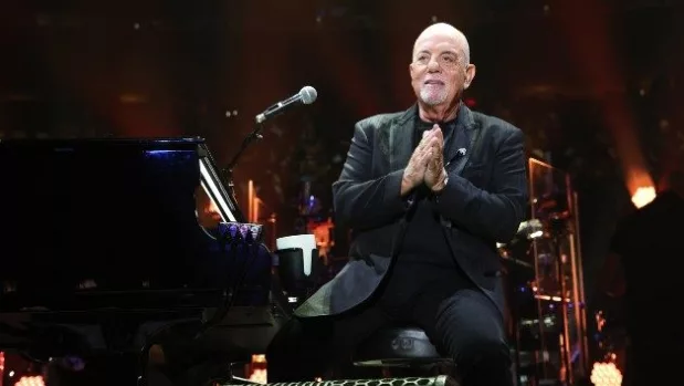 getty_billyjoelhandsclasped_052325278558