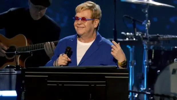 getty_eltonjohnrrhof2025smiling_12082547364