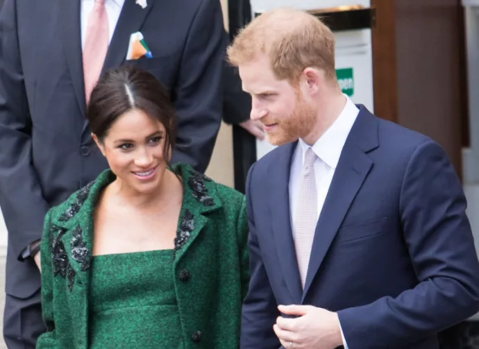 Meghan Markle and Prince Harry receive flowers after leaving Canada House on the March 11^ 2019 in London^ UK