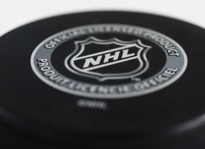 Officiel licensed hockey puck for NHL^ National hockey league.