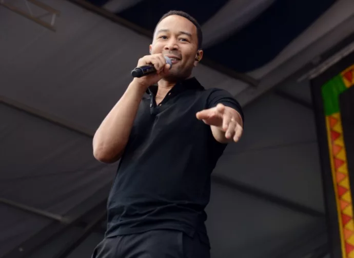 John Legend performs onstage at the 2015 New Orleans Jazz and Heritage Festival. New Orleans^ Louisiana - April 25^ 2015