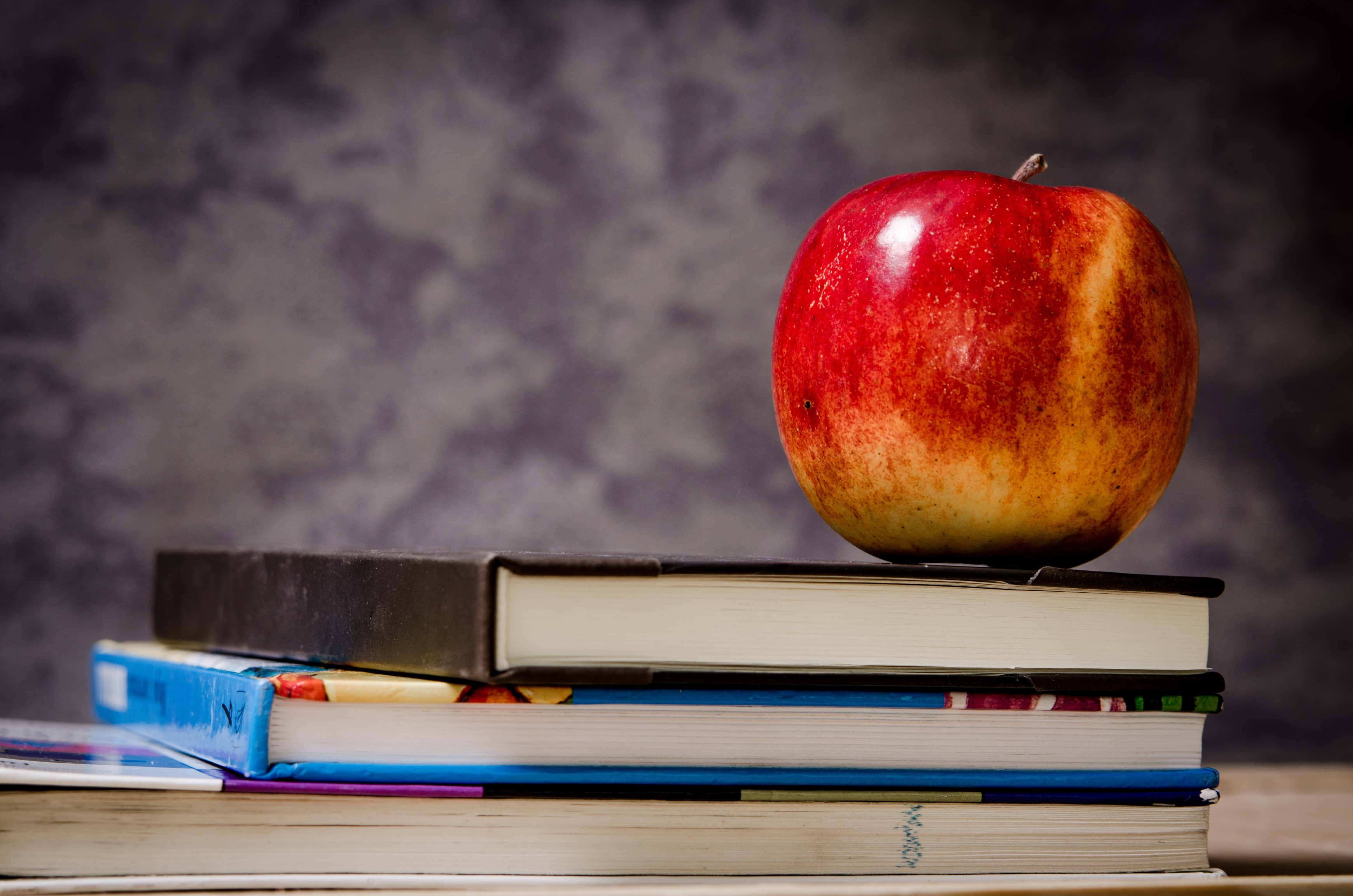 close-up-of-apple-on-top-of-books-256520-jpg