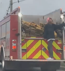 Woman Hitches Ride On Back Of Indy Fire Truck The Legend 95 9 Fm