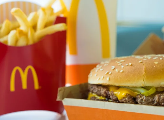 Selective focus on McDonald's Double Quarter Pounder burger with chesse^ french fries potatoes and drink.