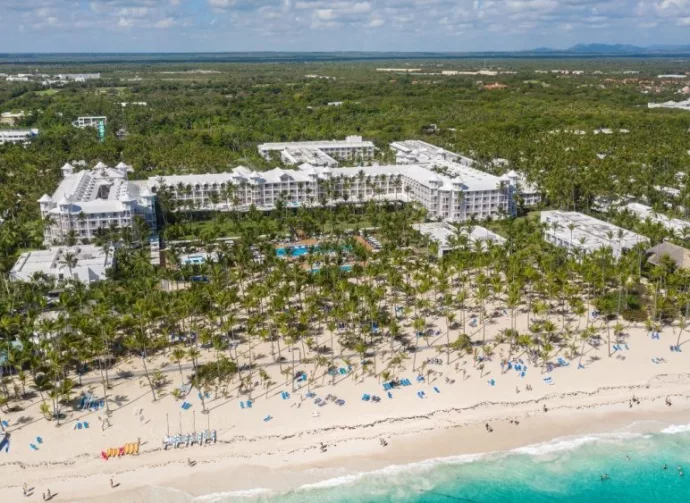 Aerial view from drone on RIU resort building on caribbean beach in Punta Cana^ Bavaro^ Dominican Republic - 8 April 2022