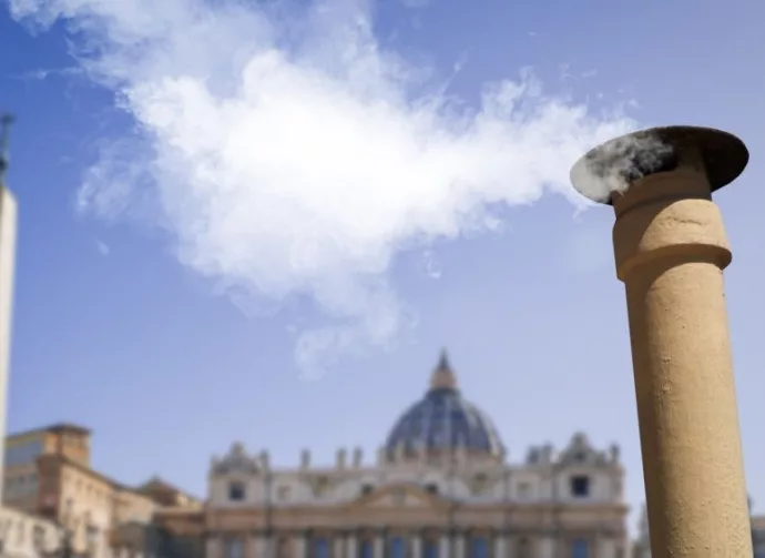 Vatican City - 04-25-2025: White smoke from the chimney on top of the Sistine Chapel. It indicates that the Pope has been elected.