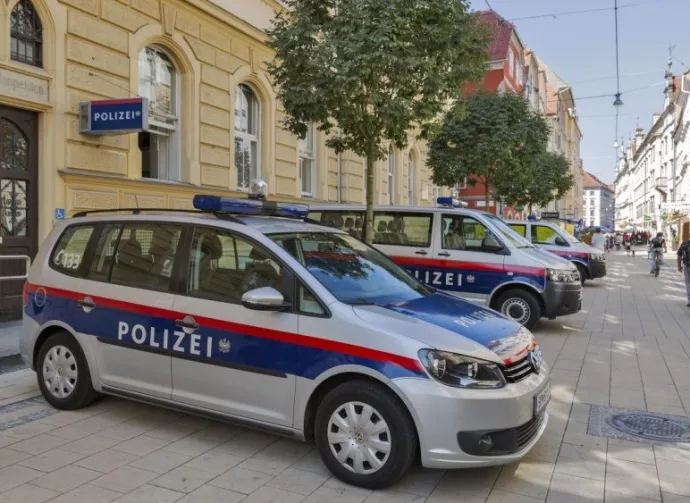 Schmiedgasse street and local police station in Graz Old Town. Graz is the capital of Styria and second largest city in Austria. GRAZ^ AUSTRIA - SEPTEMBER 11^ 2015