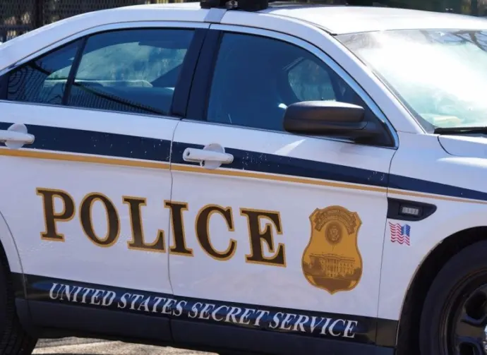A United States Secret Service Police Car parked outside an entrance to the White House. Washington DC - February 23^ 2025