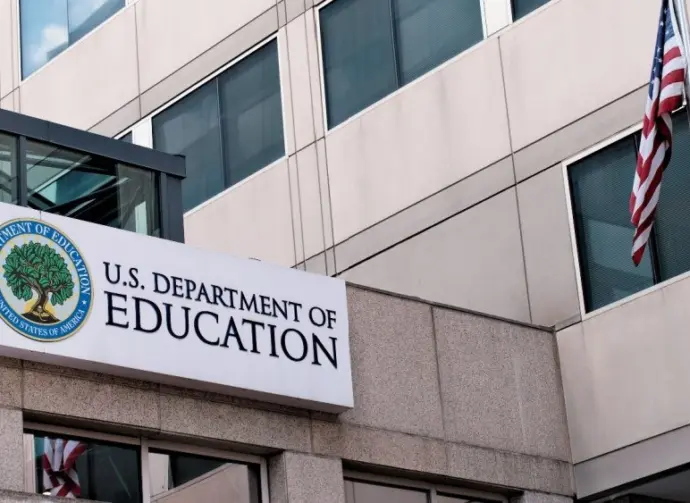 The exterior sign and US flag in front of the U.S. Department of Education offices in Washington^ DC. Washington^ DC USA; September 5^ 2024