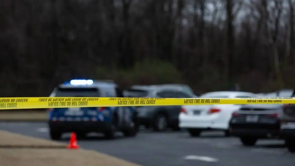 Police tape cordons off a homicide scene in Memphis^ TN on February 11th^ 2024.