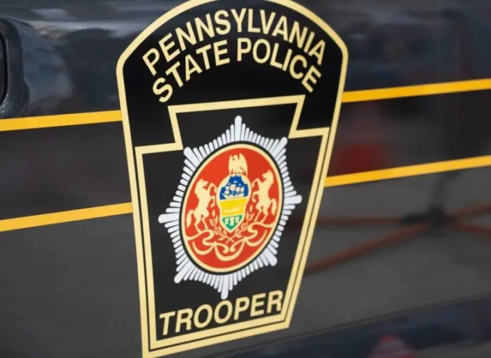 The Pennsylvania State Police Trooper emblem^ on display at the annual PA Farm Show. Harrisburg^ PA / USA - January 8^ 2020