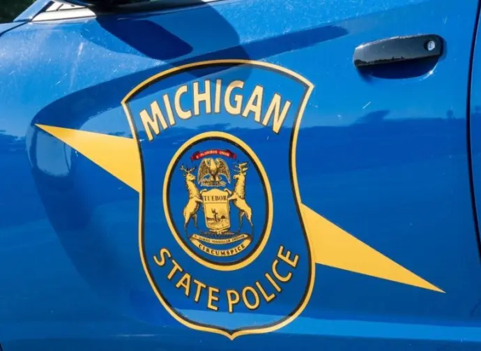 State of Michigan police coat of arms on squad car Dimondale MI - June 4^ 2022
